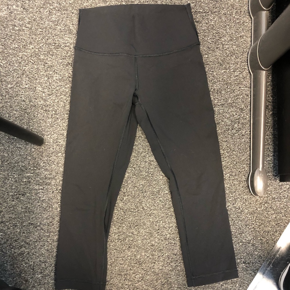 Black crop lulu leggings. Small “key” pocket.